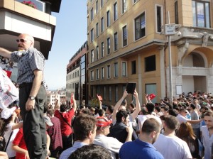 Many people were climbing up Osmanlı Sokaği beside The Marmara Hotel