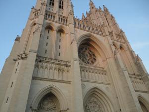Stone façade rising into a blue sky