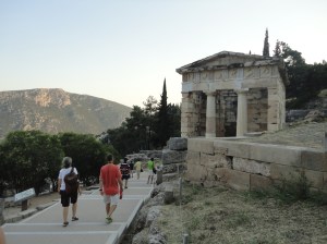 Tourists approach the Treasury of the Athenians