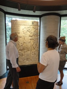 Three persons in a museum