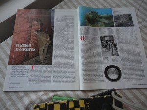 Magazine open to the quoted article. The largest photo is of a man with his face to a brick wall, presumably looking through a peephole