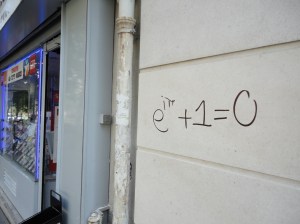 e^iπ^ + 1 = 0, written on a wall next to a plate glass window